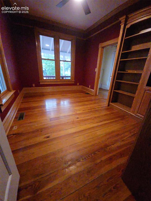 Image 44 of 45: Main House/602: Study with built-ins can be used as a 5th bedroom