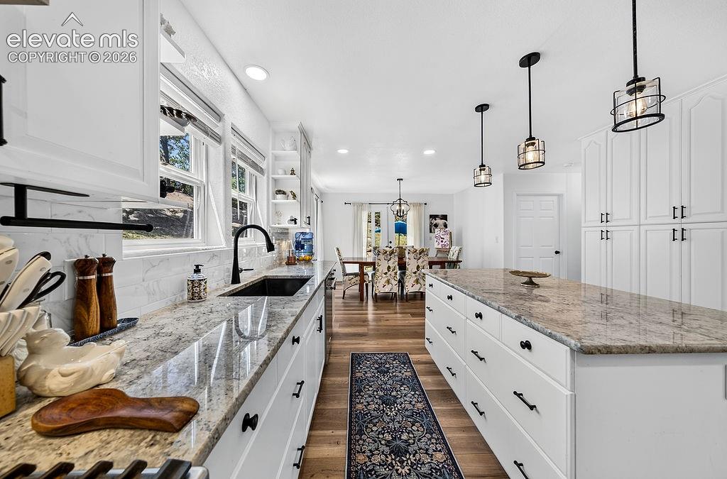Image 13 of 50: Main house- kitchen and dining area