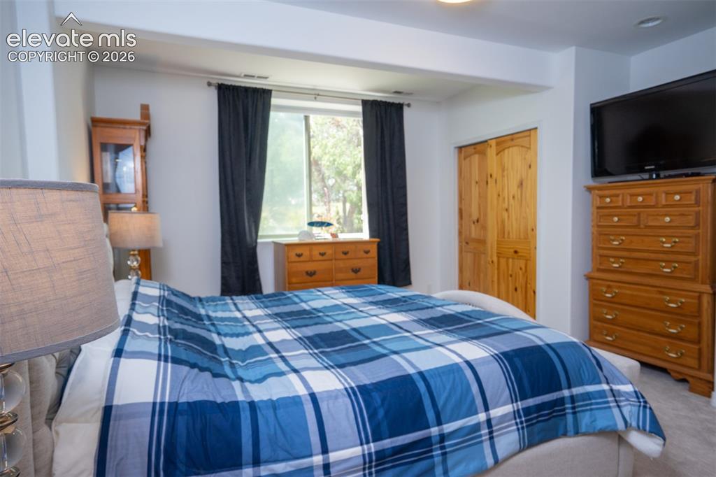 Image 34 of 50: The 2nd primary bedroom offers two closets within the BR and a full size wa