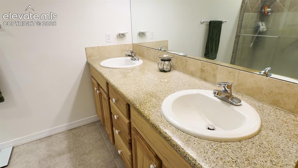 Image 35 of 50: The 2nd primary bathroom with dual vanity
