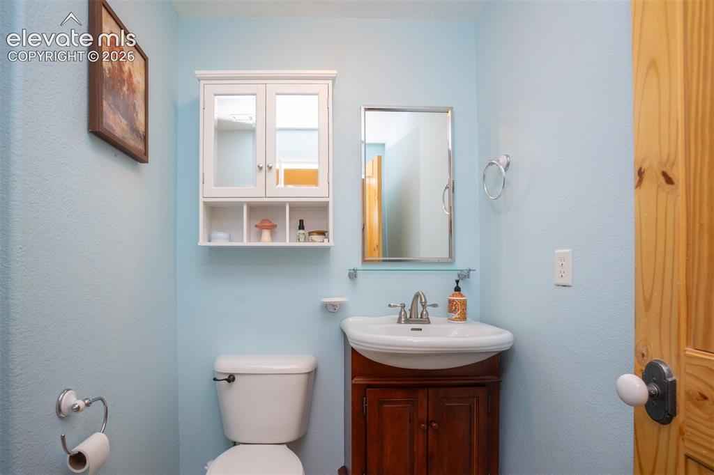 Image 38 of 50: This is the 2nd bathroom in the basement apartment. Not shown is the shower