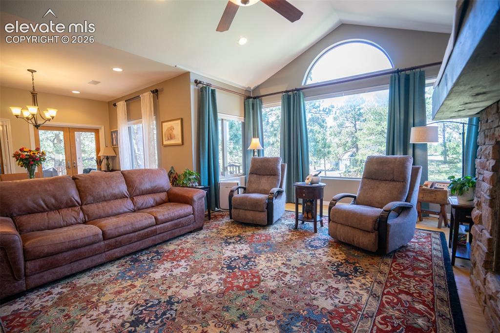 Image 8 of 50: Notice the openness between the living room and dining area is open and bri