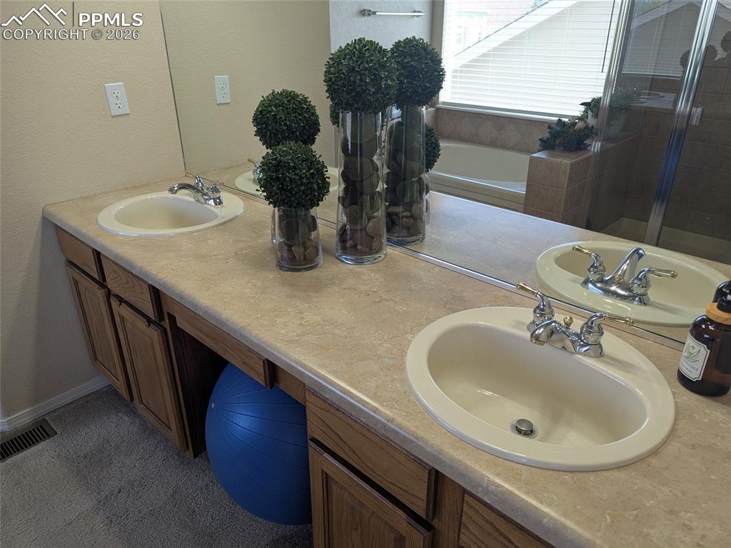 Image 13 of 26: Master Bathroom