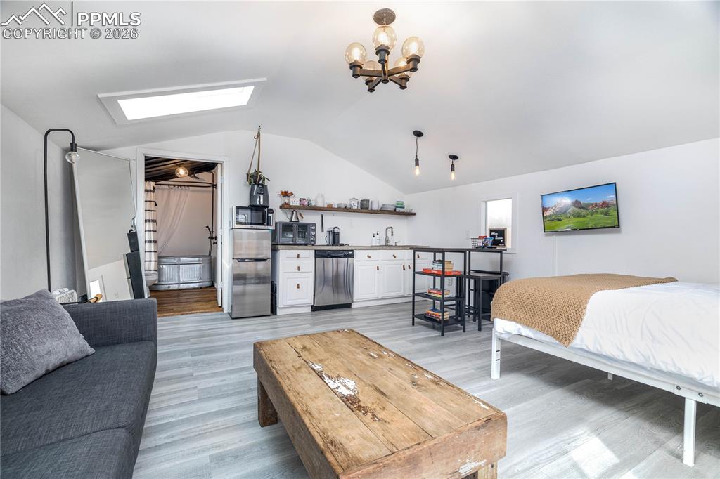 Image 21 of 40: Bedroom/Living Area/Kitchen in Cottage