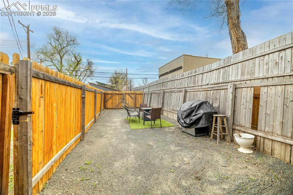 Image 32 of 40: Separate private yard off of cottage.