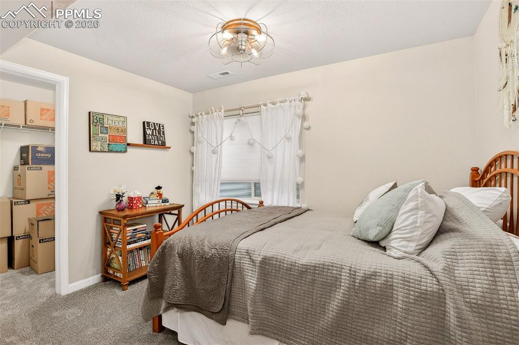 Image 27 of 34: Bedroom