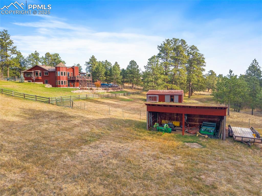 Image 44 of 49: Loafing shed surrounded by beautiful pastures  