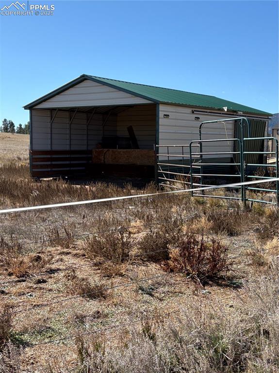 Image 27 of 32: View of outdoor structure with an exterior structure
