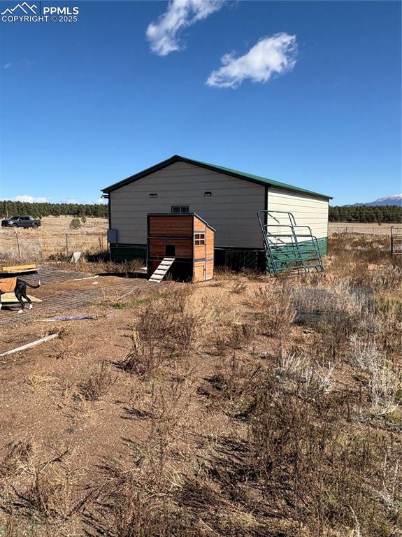 Image 27 of 31: View of outdoor structure featuring a rural view