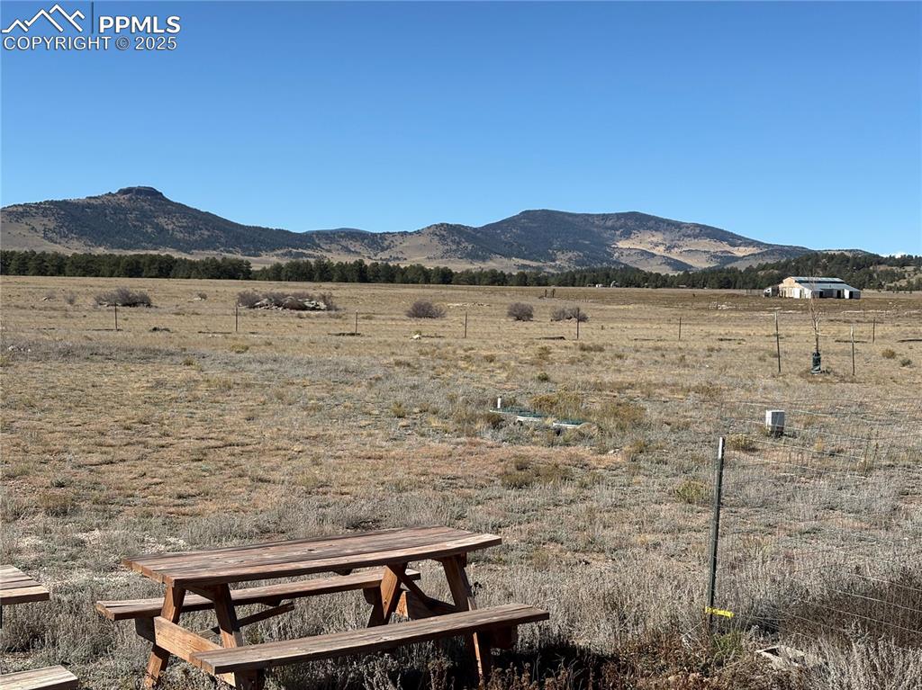 Image 31 of 32: View of mountain background featuring rural landscape