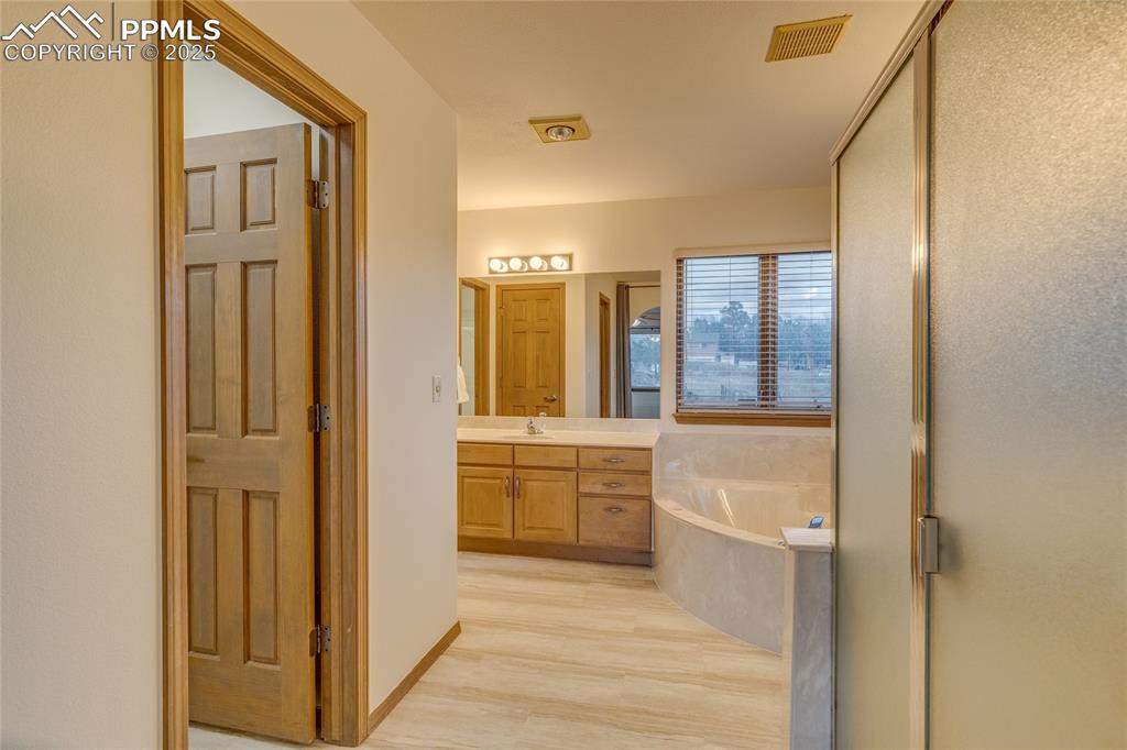 Image 23 of 48: Primary bathroom 