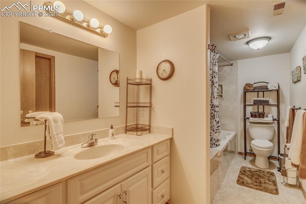 Image 38 of 48: Ensuite full bath at secondary suite in basement 