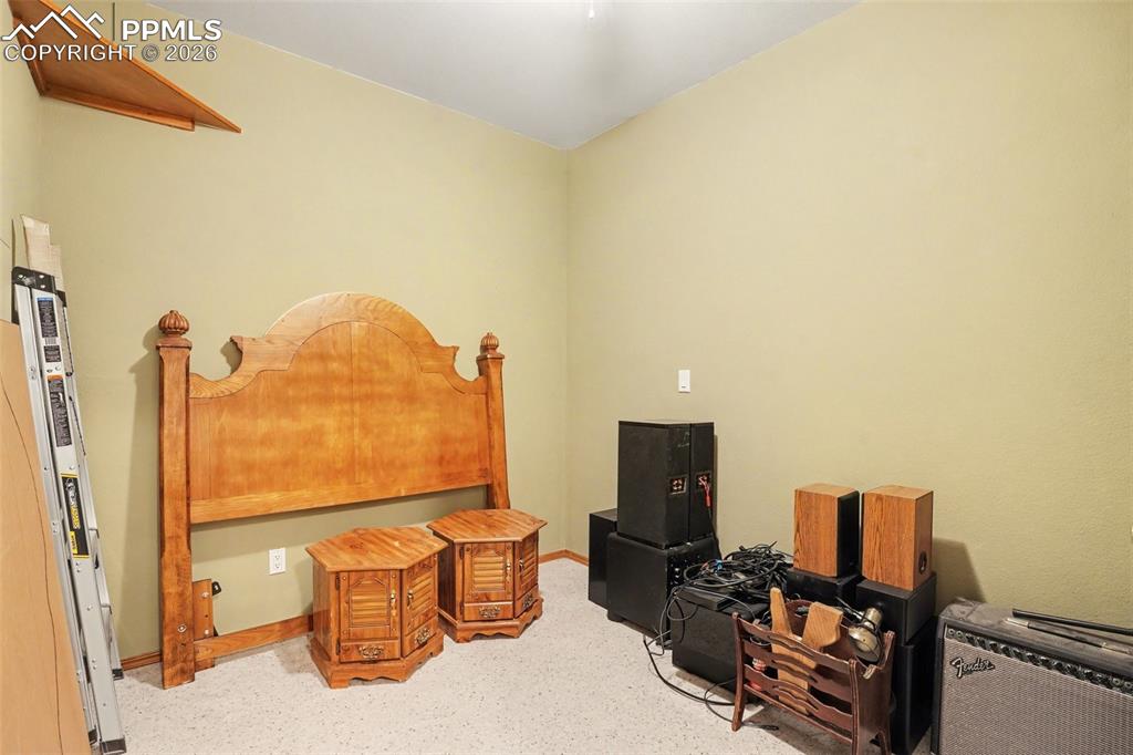 Image 30 of 39: Hobby or crafting room, maybe a wine cellar (temperature stays nice and coo