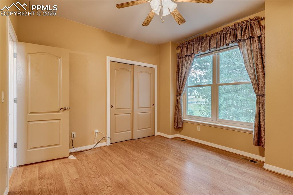 Image 22 of 48: Bedroom/Office at front entry 