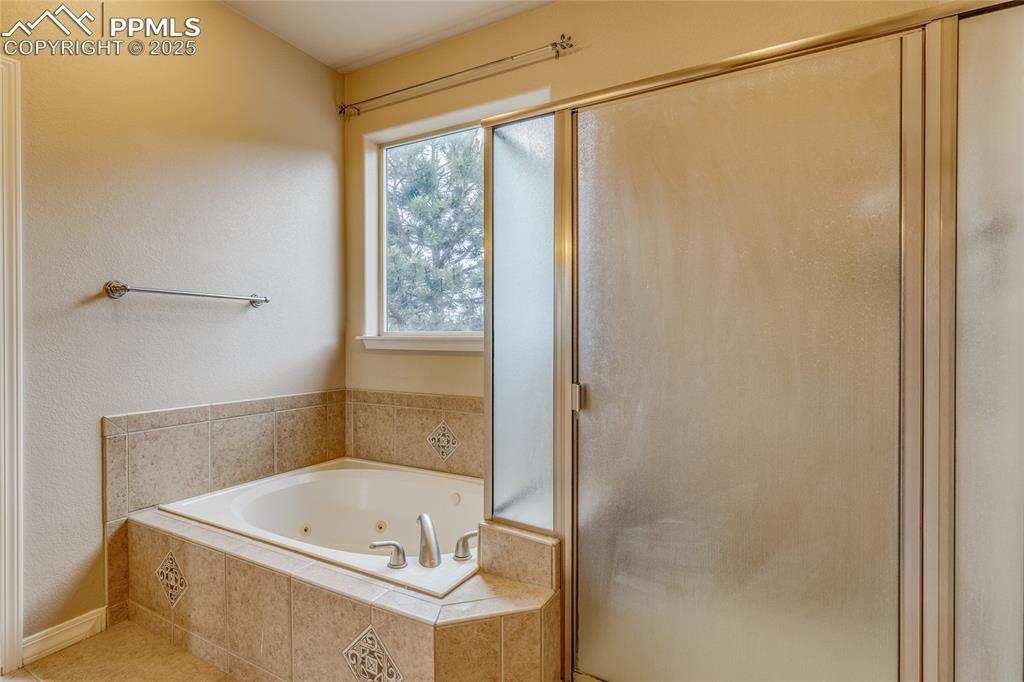 Image 30 of 48: Master bathroom 