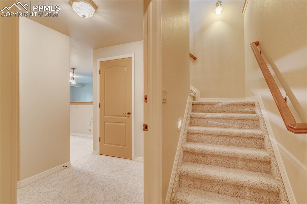 Image 32 of 48: Stairs from main level to basement 