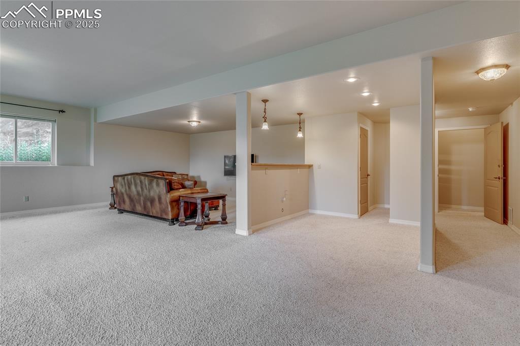 Image 33 of 48: Huge family/rec room in walk out basement 