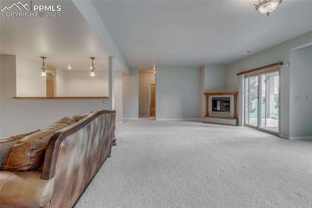 Image 37 of 48: Family/rec room looking toward walk out to back patio