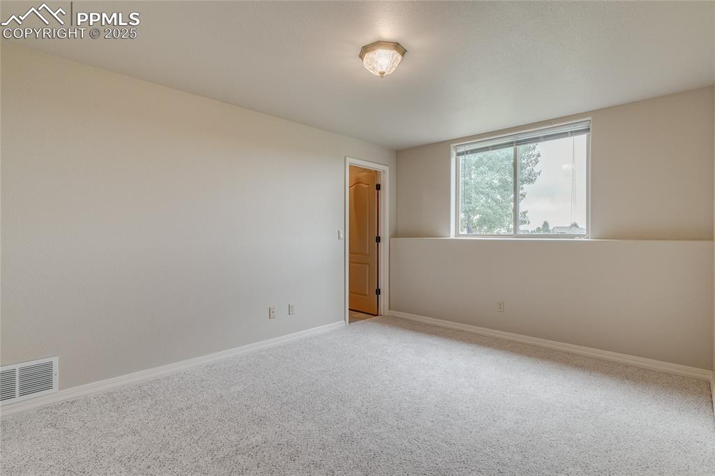 Image 40 of 48: Bedroom in basement