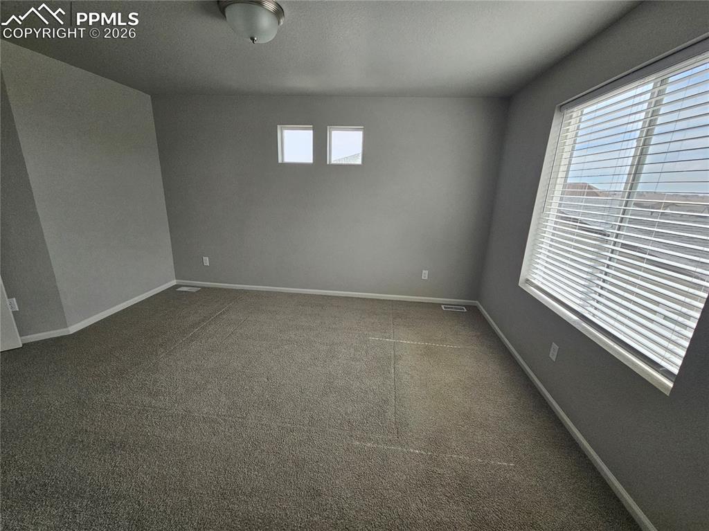 Image 8 of 14: Master Bedroom