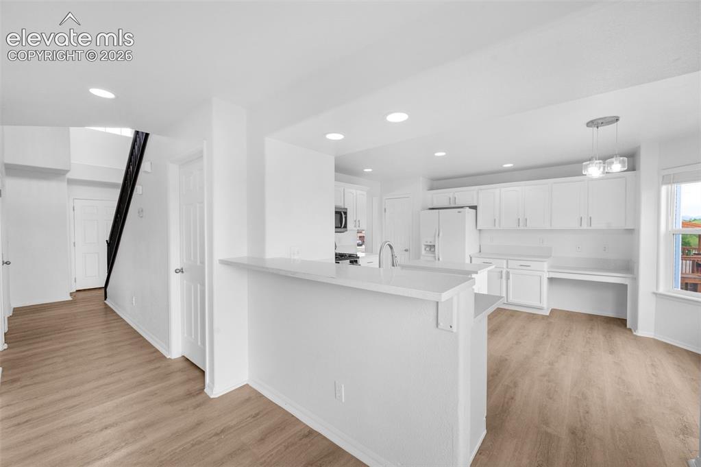 Image 10 of 35: See loft that overlooks the family room