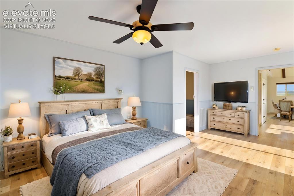 Image 17 of 50: Virtually staged primary bedroom