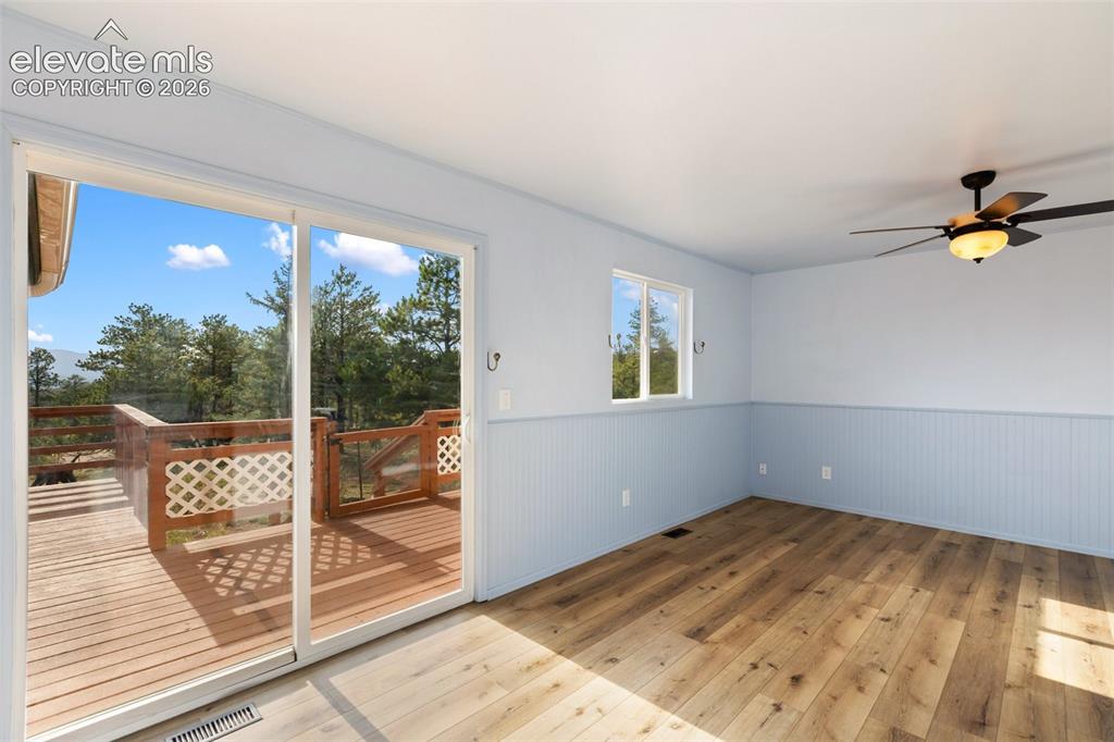 Image 20 of 50: Walkout to attached deck!