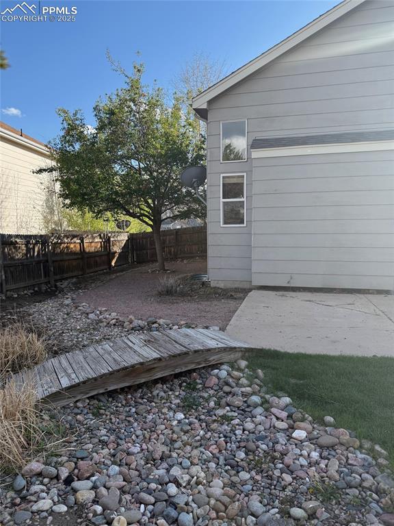 Image 29 of 34: View of yard with a patio area