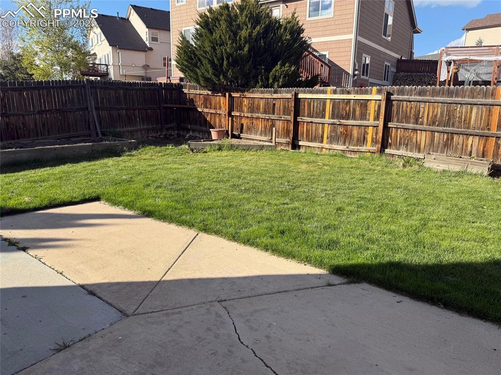 Image 31 of 34: View of yard featuring a patio