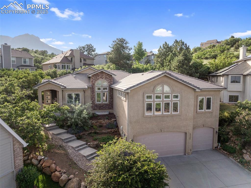 Caption: Luxury home with over 5,000 sqft on the west-side offering mountain & city views