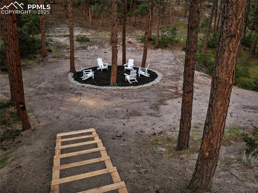 Image 47 of 49: There is even a side yard for extra entertainment space or to build a barn