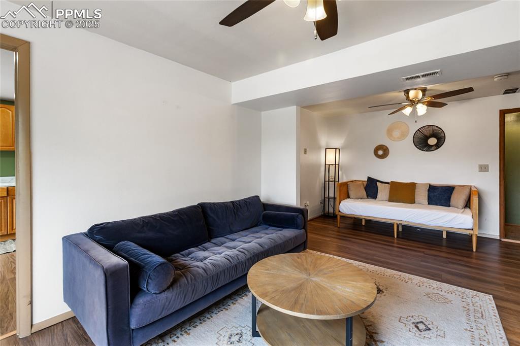 Image 30 of 50: Downstairs has large family room and walks out to the back.