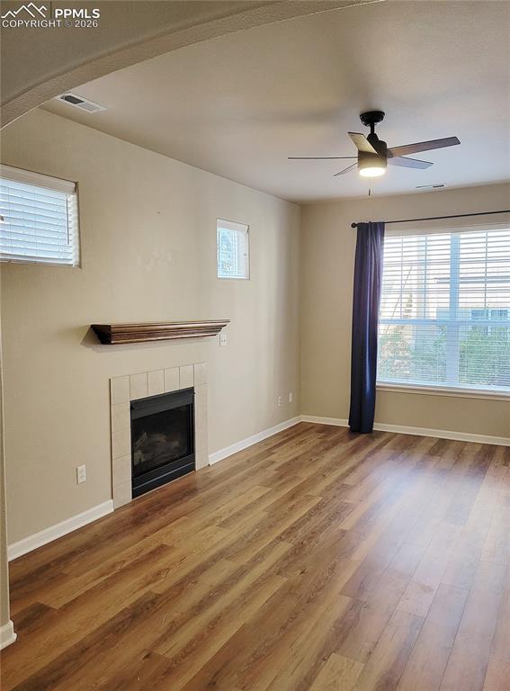 Image 17 of 38: Photo of living room and fireplace (before furniture).