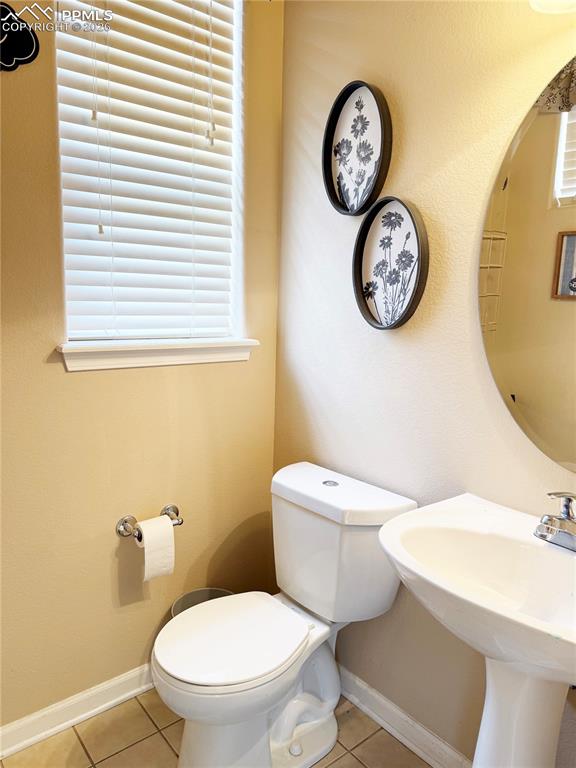 Image 6 of 38: Main level half bath