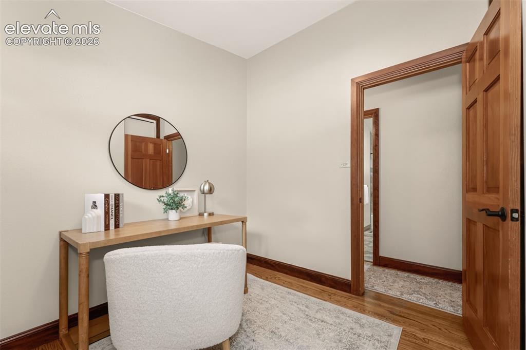 Image 18 of 36: Second bedroom on the main level.