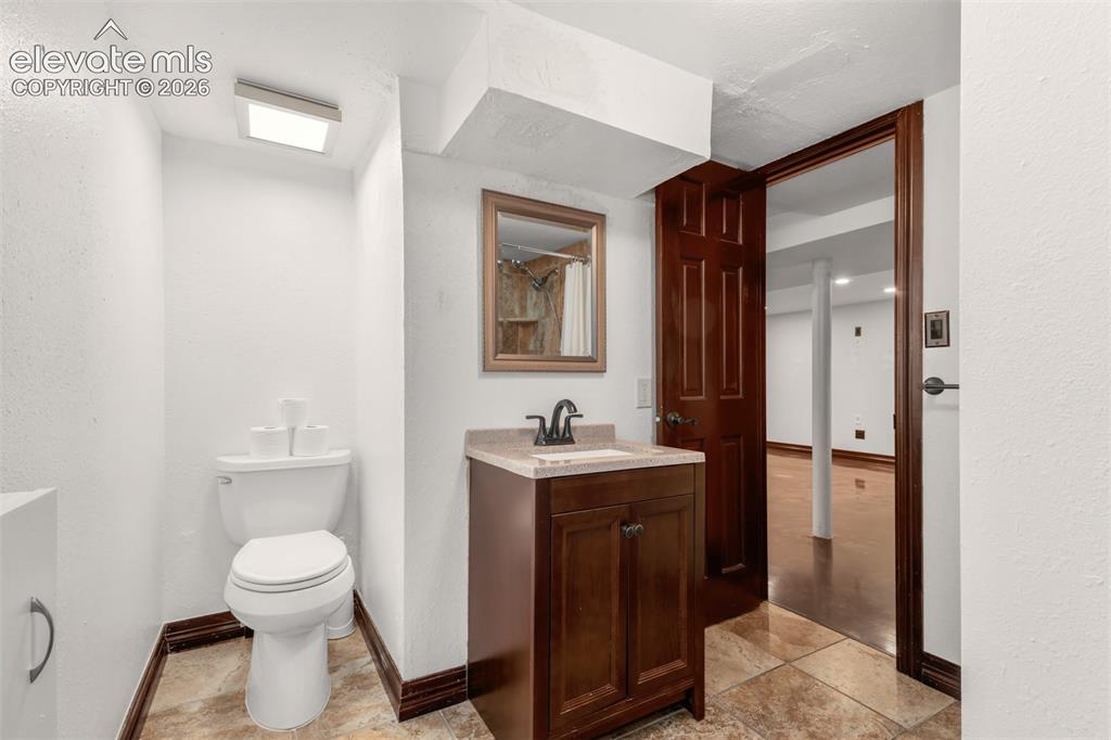 Image 23 of 36: Basement bathroom.