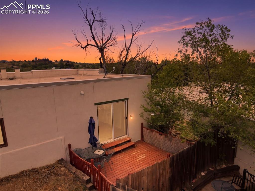 Image 33 of 36: Private back deck under those Colorado skies!