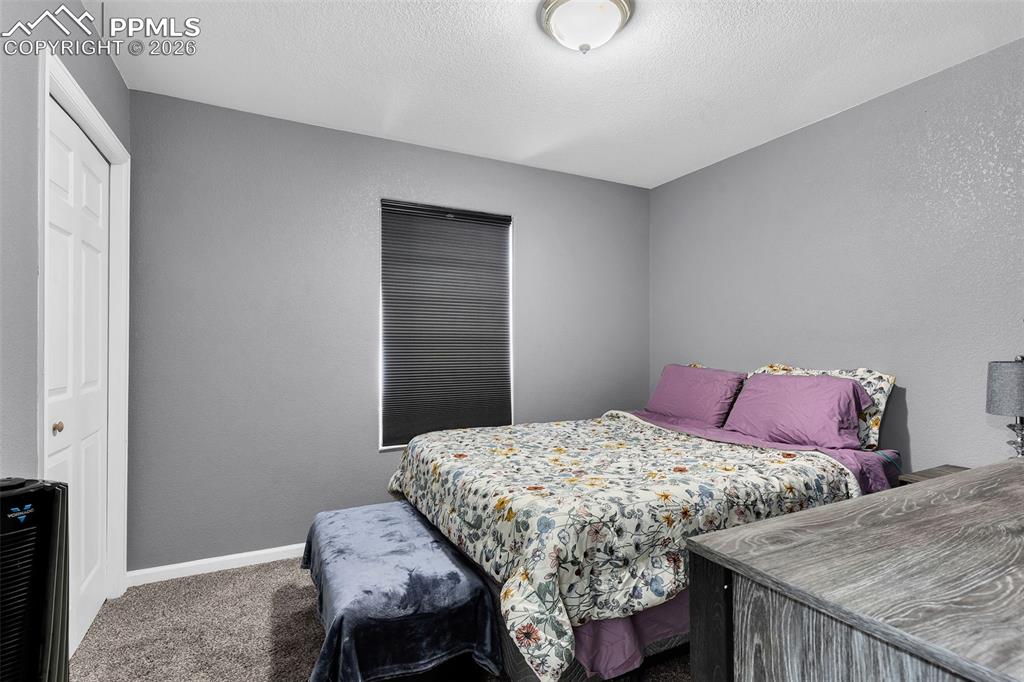 Image 19 of 38: Bedroom