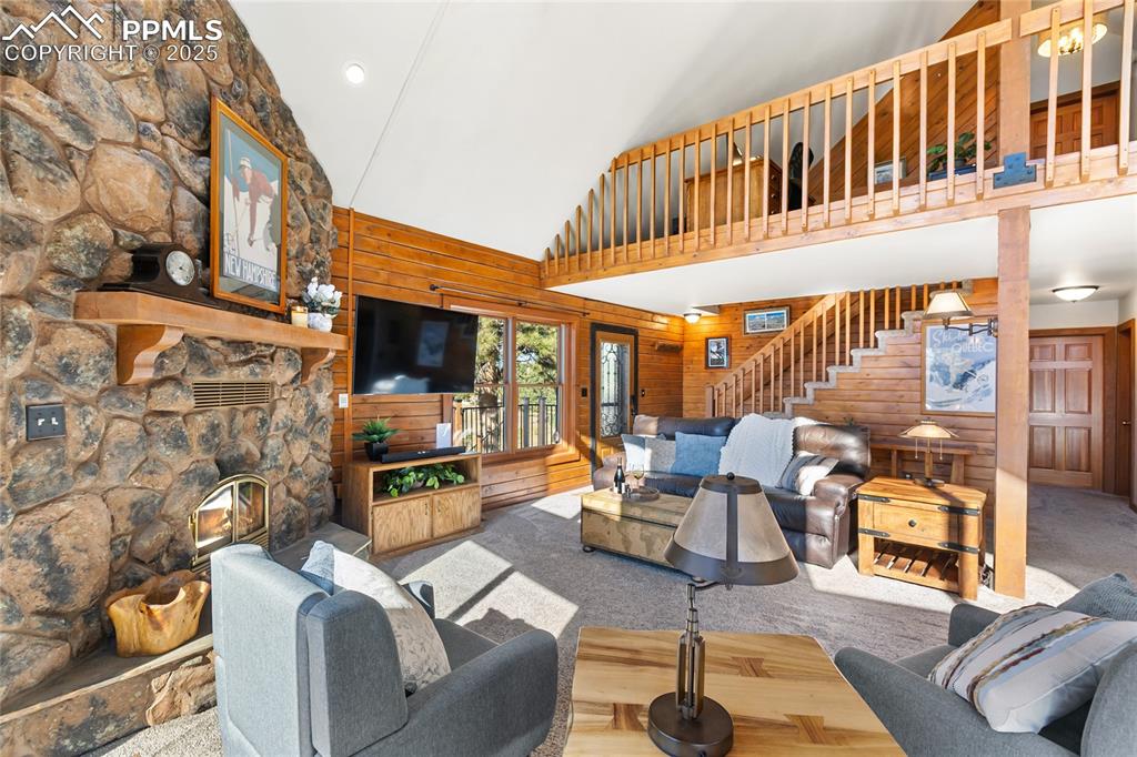 Image 18 of 50: Stunningly beautiful with huge windows, vaulted ceilings, and stone firepla