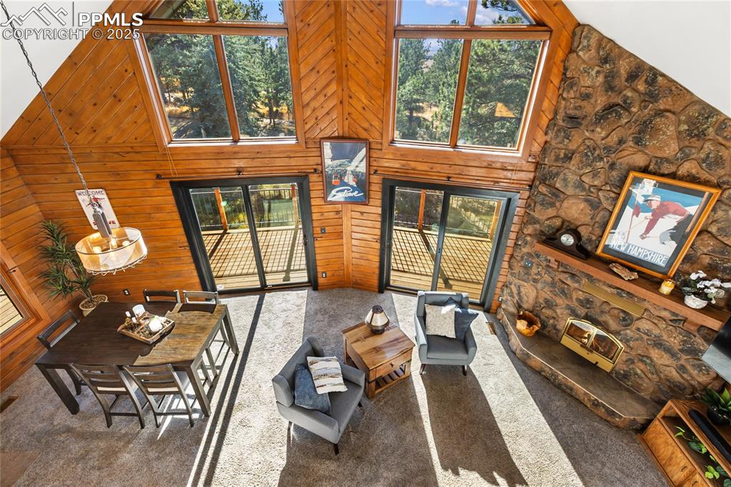 Image 3 of 50: Stunningly beautiful with huge windows, vaulted ceilings, and stone firepla