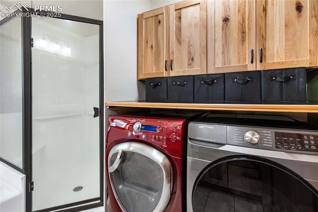 Image 45 of 50: Laundry off the primary bedroom.