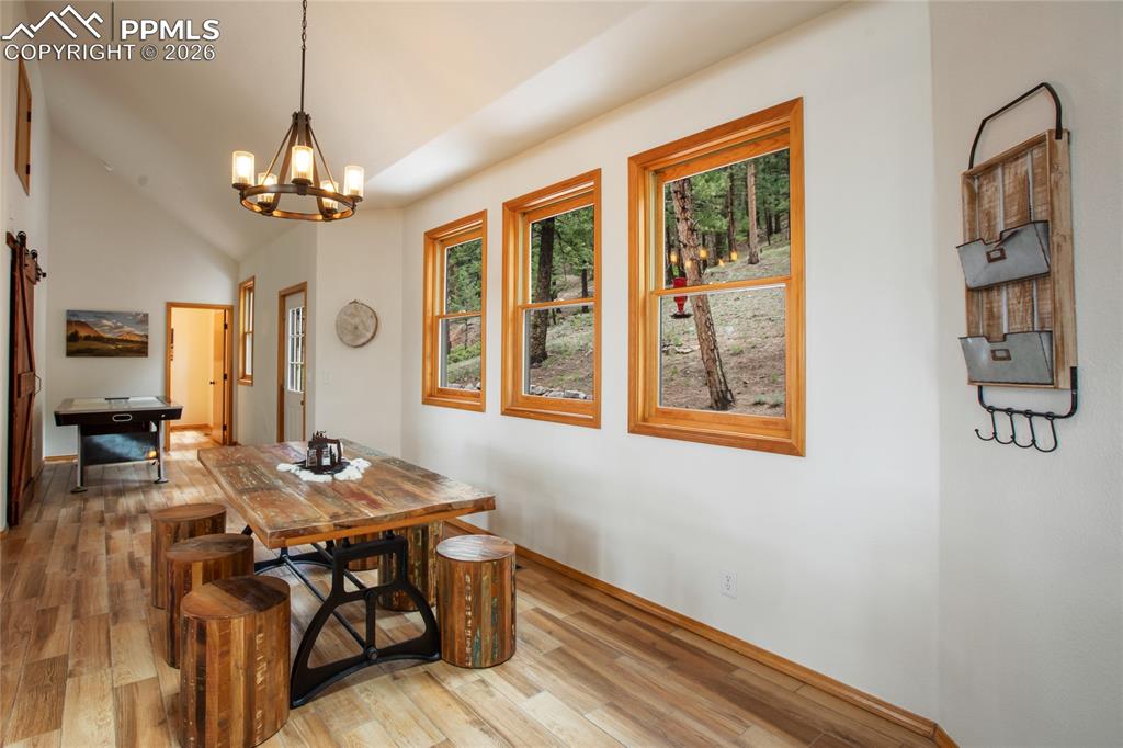 Image 12 of 34: And this dining area has lots of extra space for more seating, entertainmen