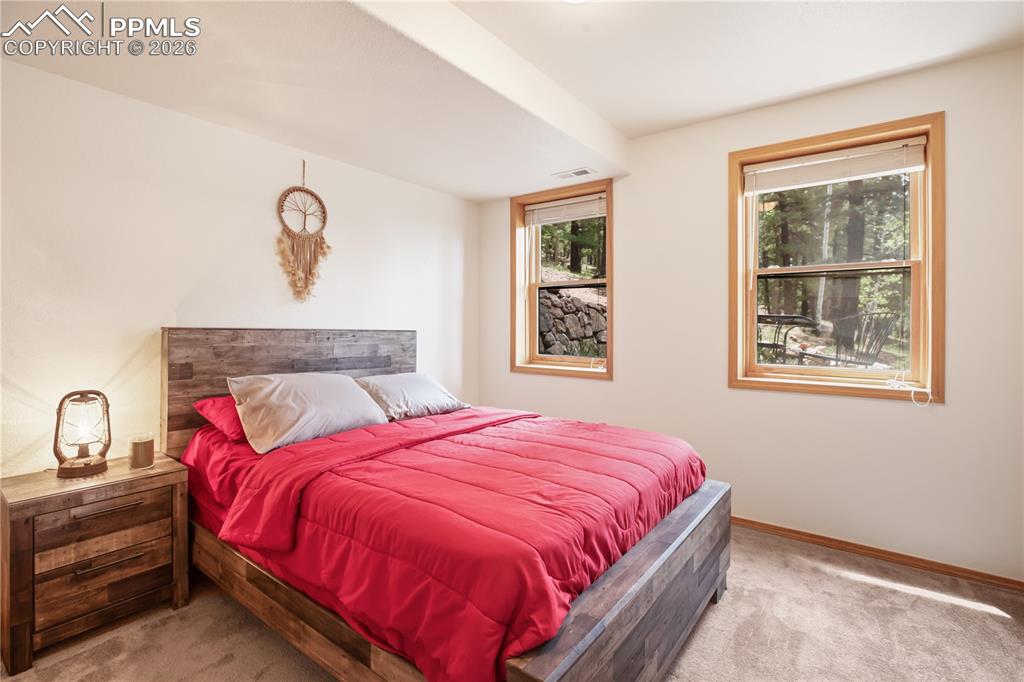 Image 21 of 34: Two of two bedrooms on the lower level