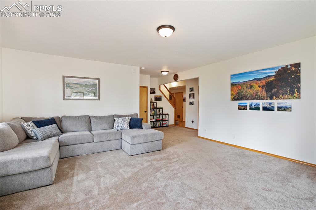 Image 24 of 34: A different viewpoint of the lower level family room