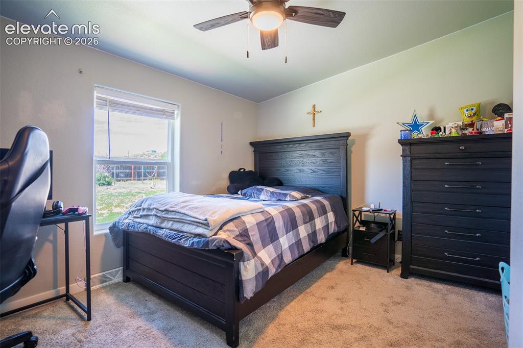 Image 15 of 28: Bedroom