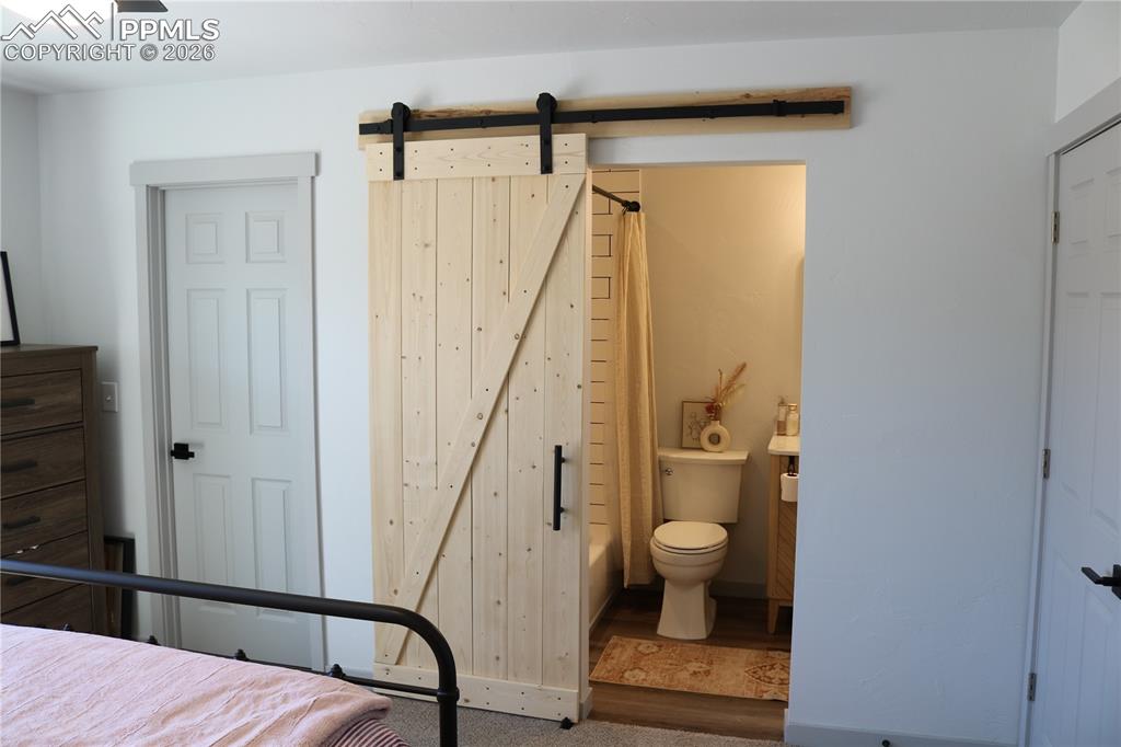 Image 11 of 23: Bedroom