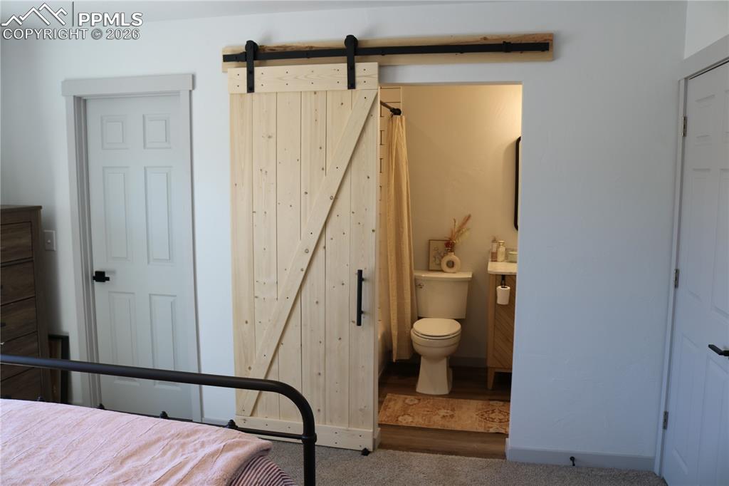 Image 12 of 23: Bedroom