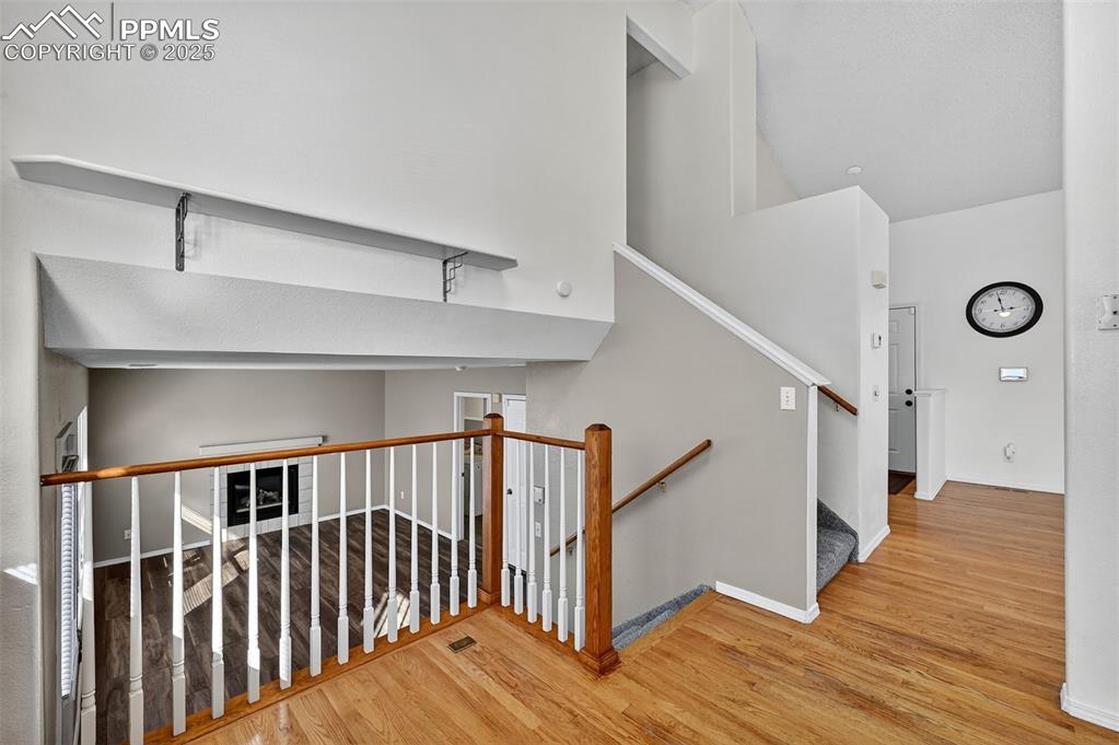 Image 14 of 30: Stairs to lower Family Room.