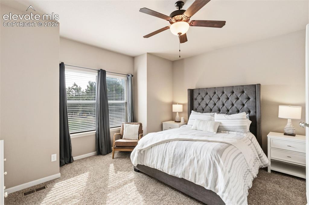 Image 12 of 40: Main level bedroom 1