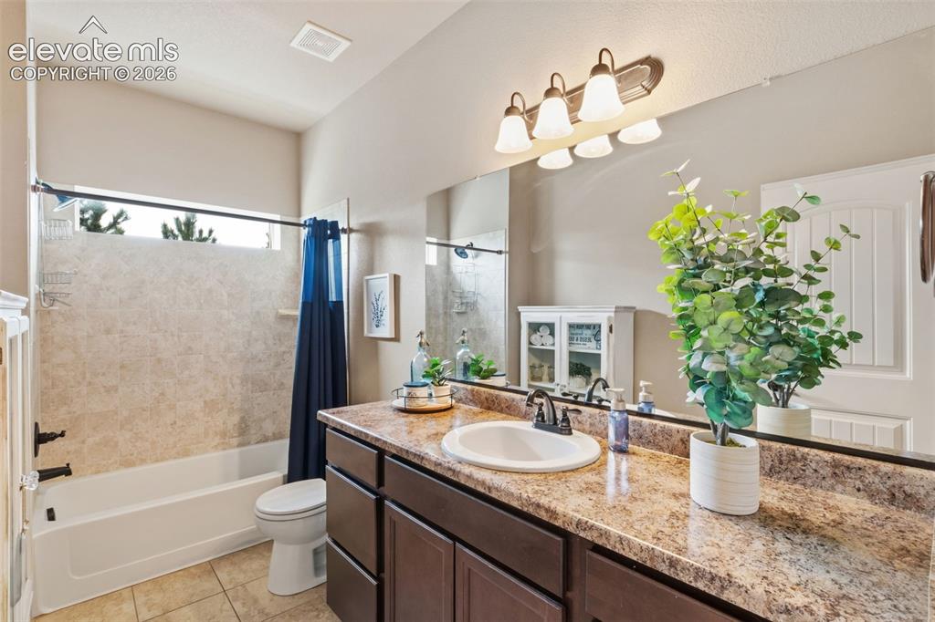 Image 14 of 40: main level bathroom